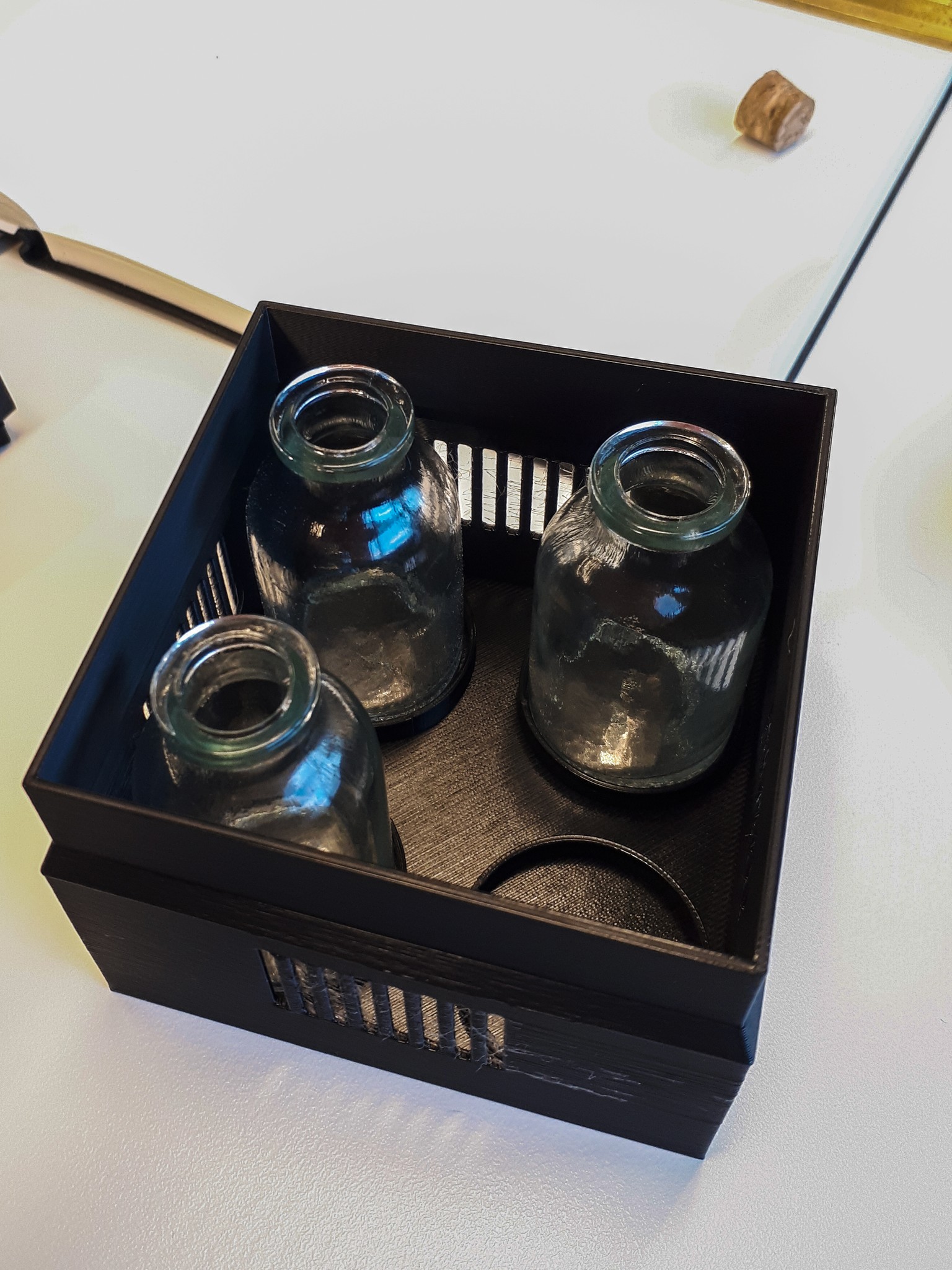 the fragrance box of the Scentony device holding three scent bottles – Liam Aljundi